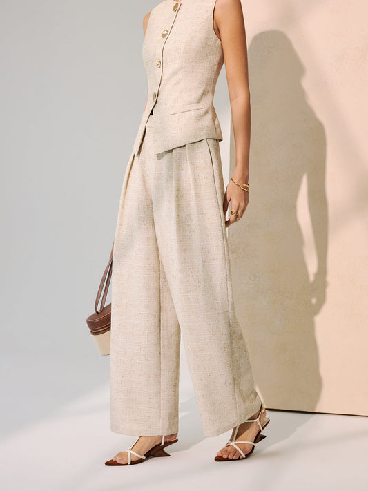 Set van metalen knopvest en Brede broek