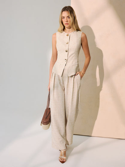 Set van metalen knopvest en Brede broek